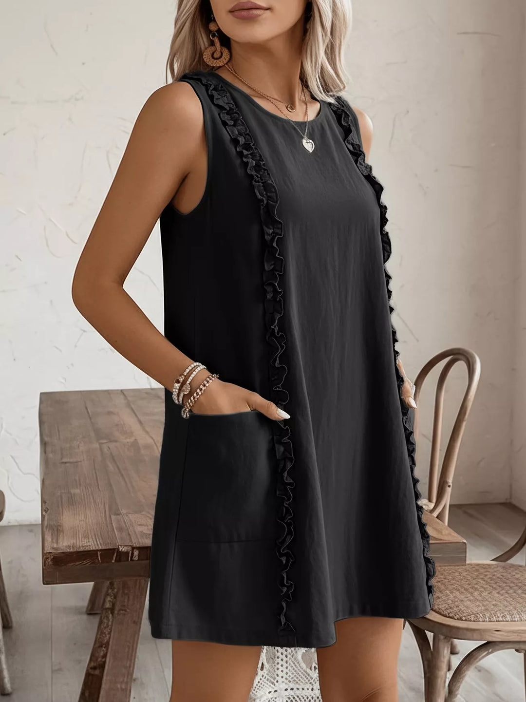 Ruffle-trim sleeveless mini dress with side pockets