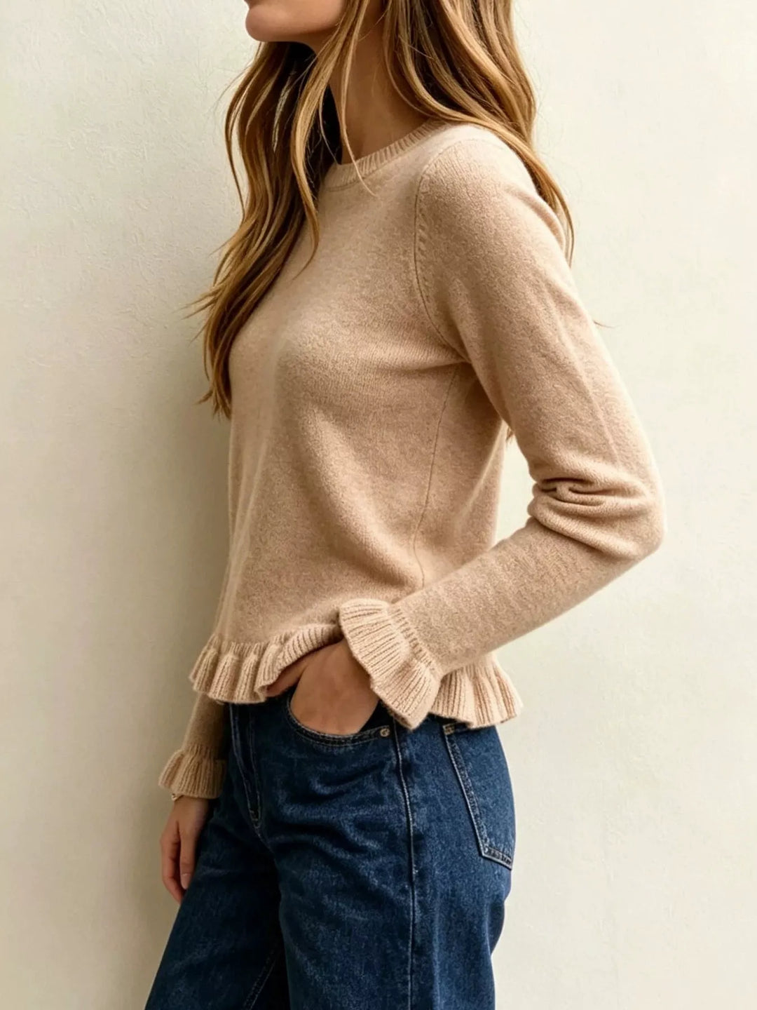 Ruffle hem crew neck knit sweater with ruffled cuffs
