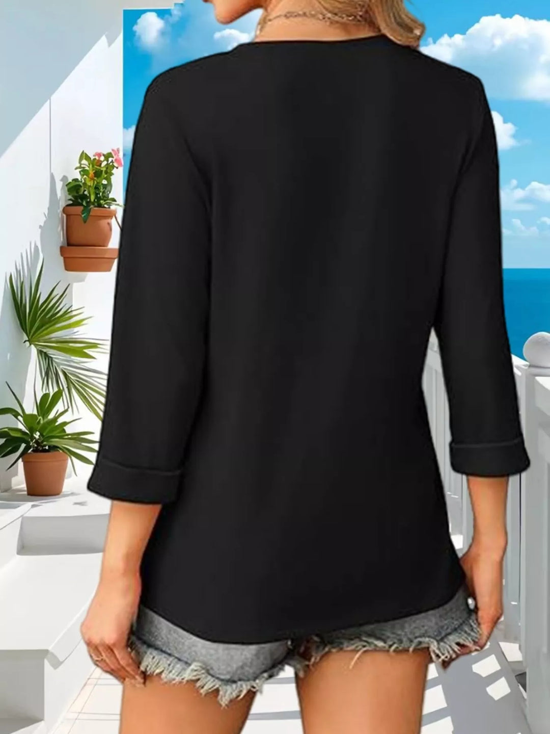 V-neck 3/4 sleeve relaxed top with cuffed hem