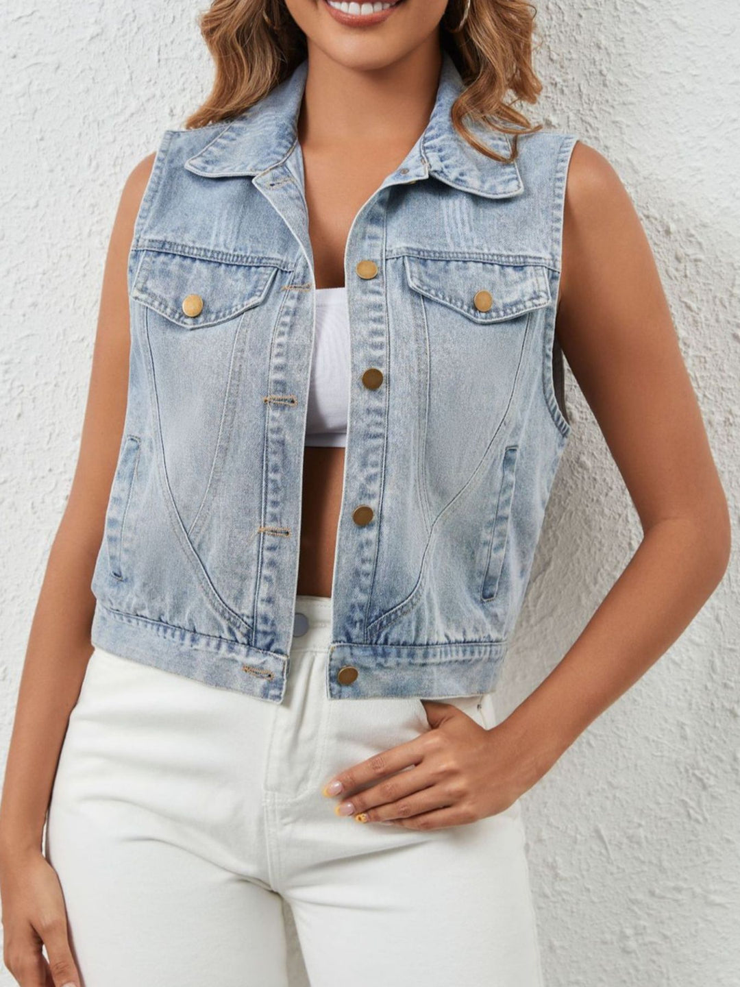 Light Blue Sleeveless cropped denim vest with flap pockets