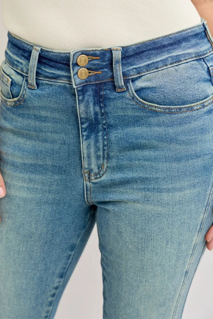 High-rise vintage wash flare jeans with released hem