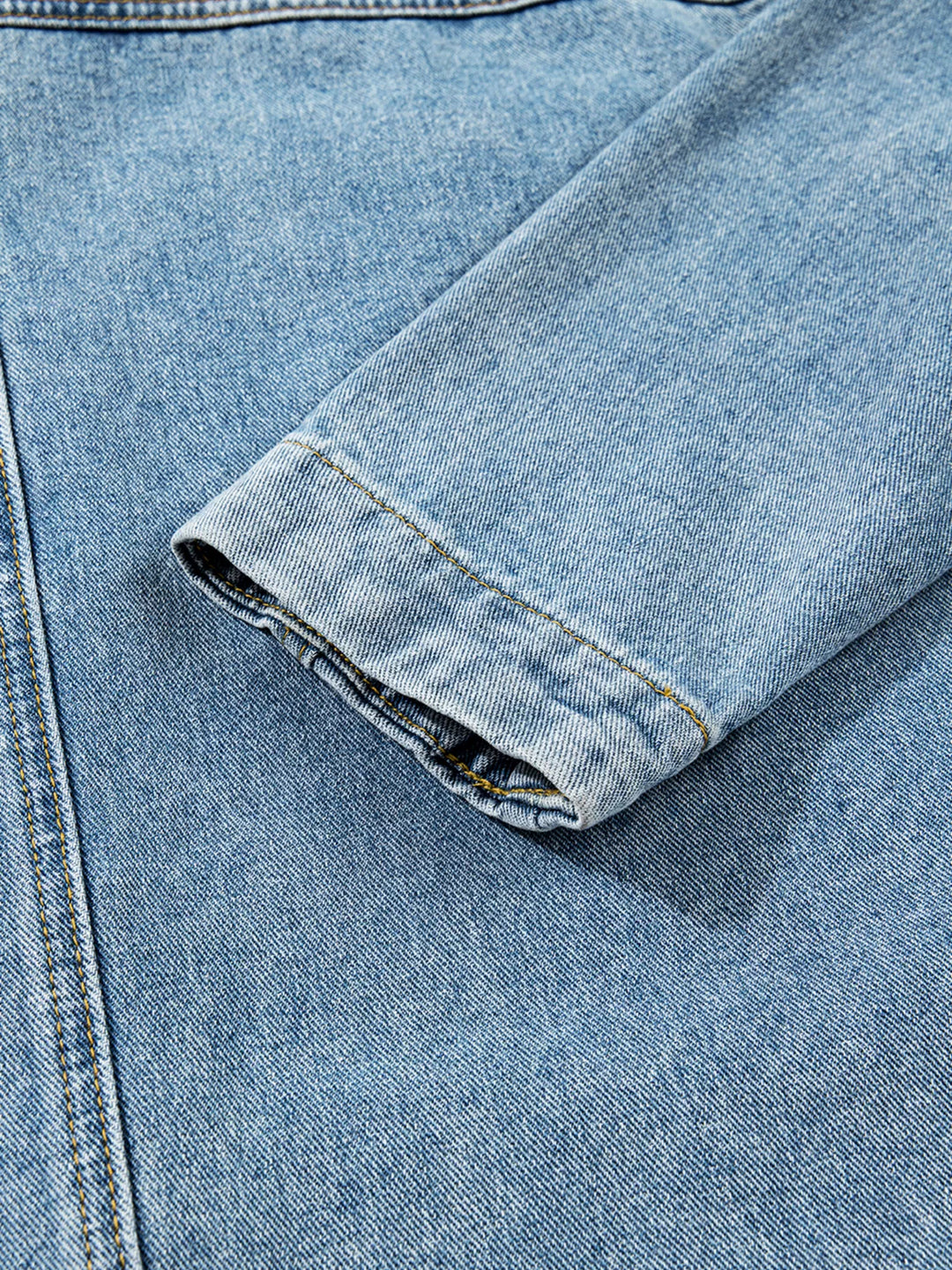 Oversized denim jacket with patch pockets and side ties