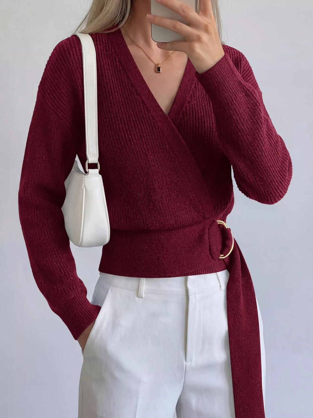 Ribbed knit wrap sweater with gold O-ring belt tie