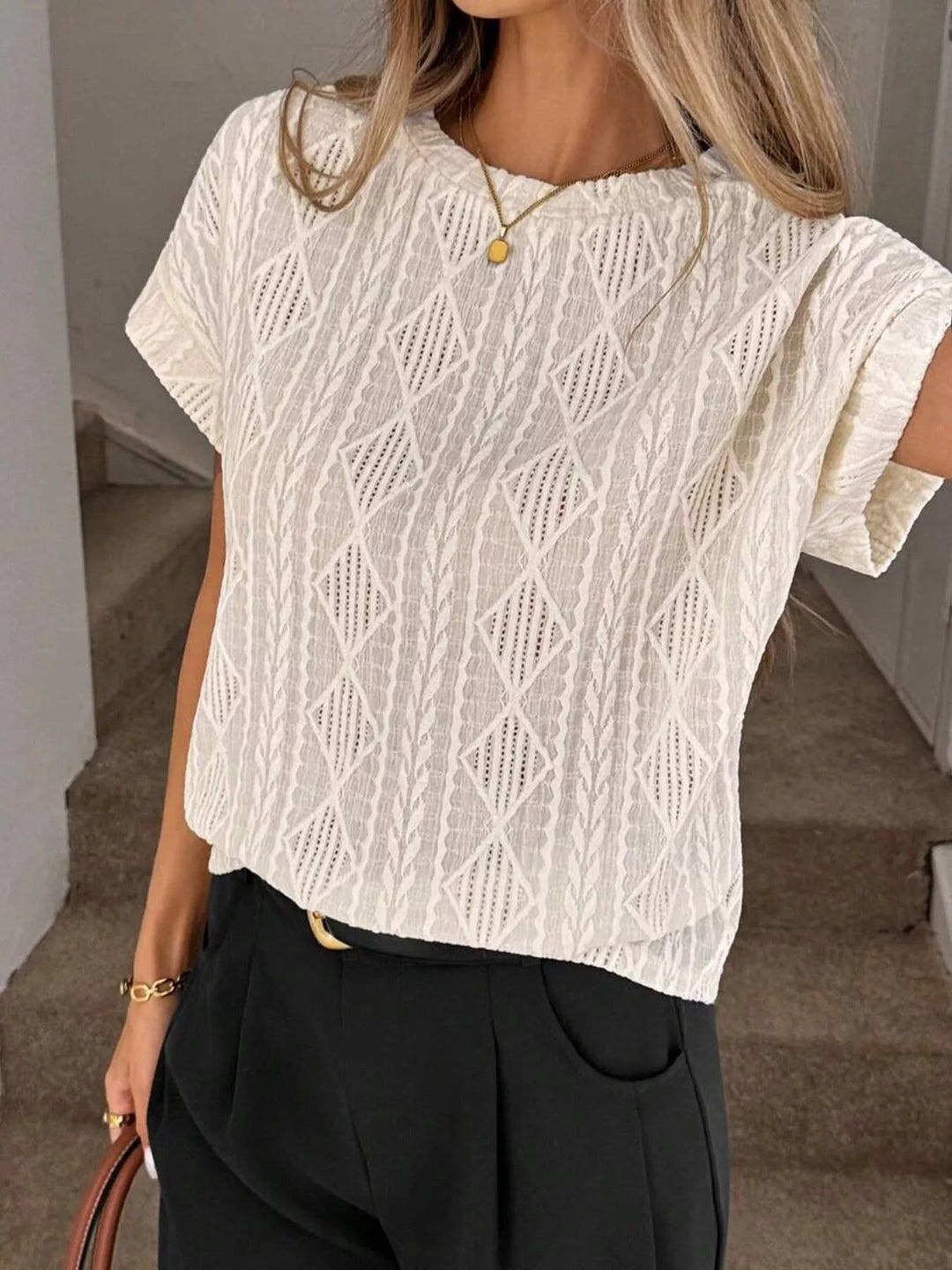 Textured diamond knit round neck top with cap sleeves
