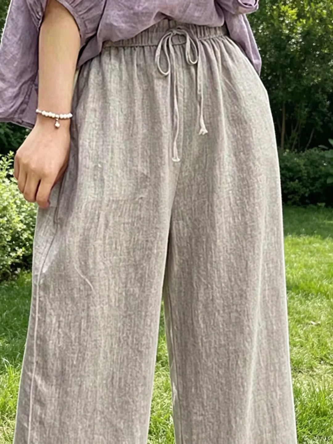 Wide leg drawstring pants with side pockets