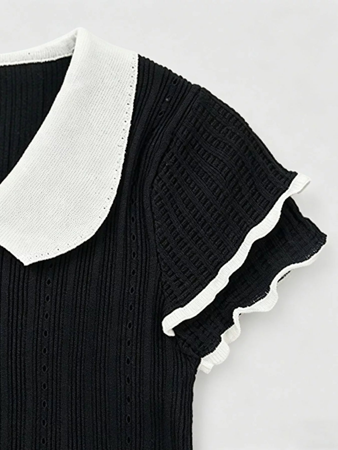 Ribbed knit crop top with Peter Pan collar and ruffle sleeves