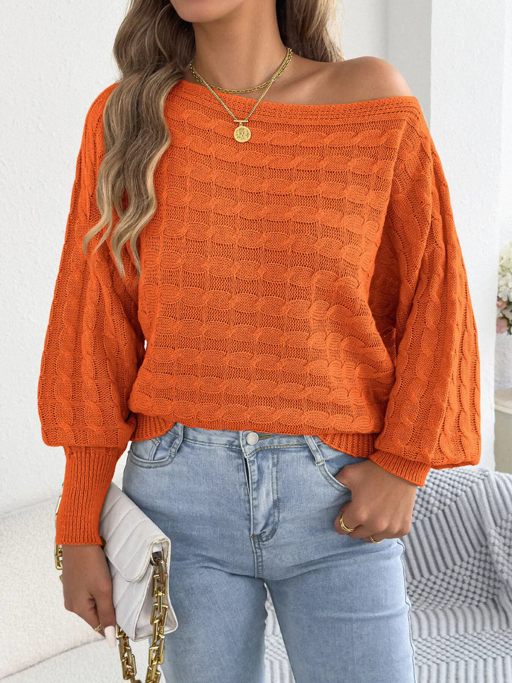 Cable knit boat neck sweater with dolman sleeves