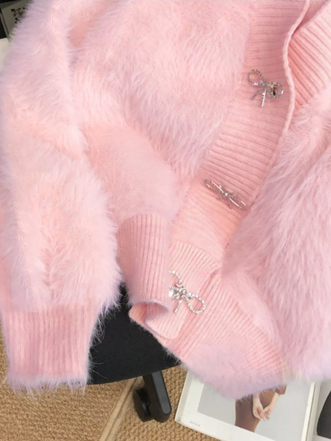Fuzzy knit cropped cardigan with rhinestone bow buttons