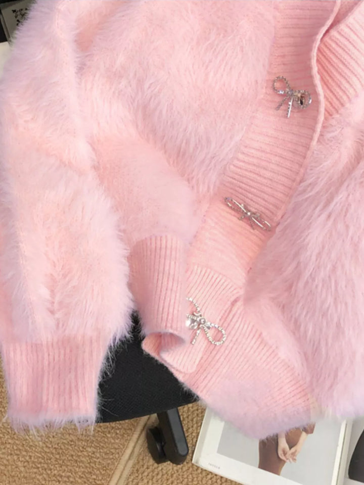 Fuzzy knit cropped cardigan with rhinestone bow buttons