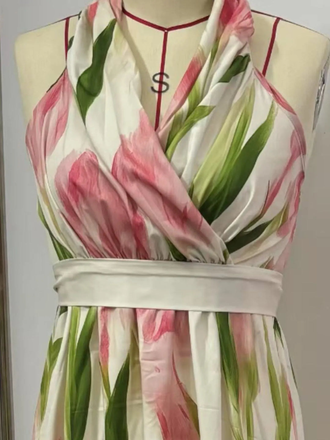 Pleated floral halter maxi dress with tie back