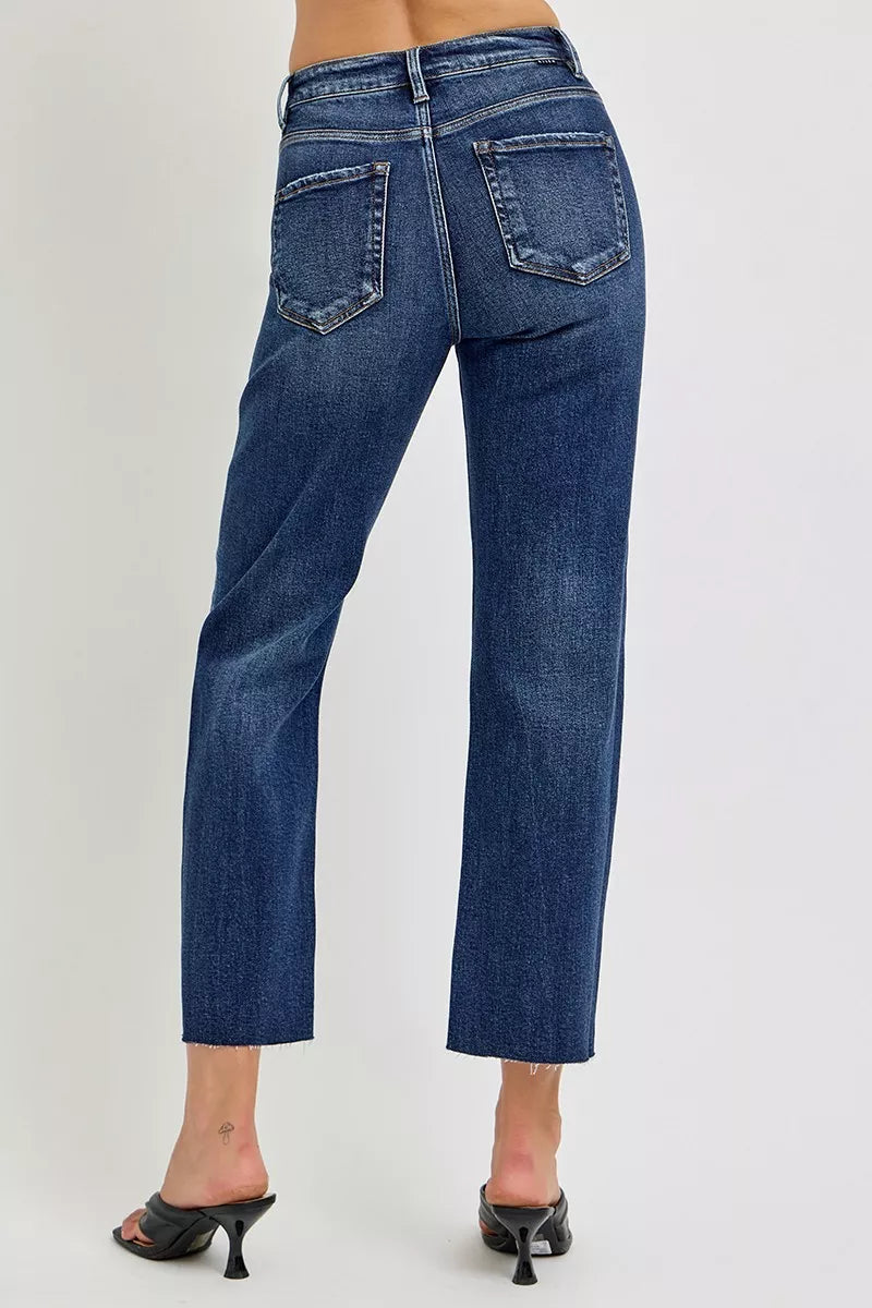 High rise slim barrel jeans with raw frayed hem