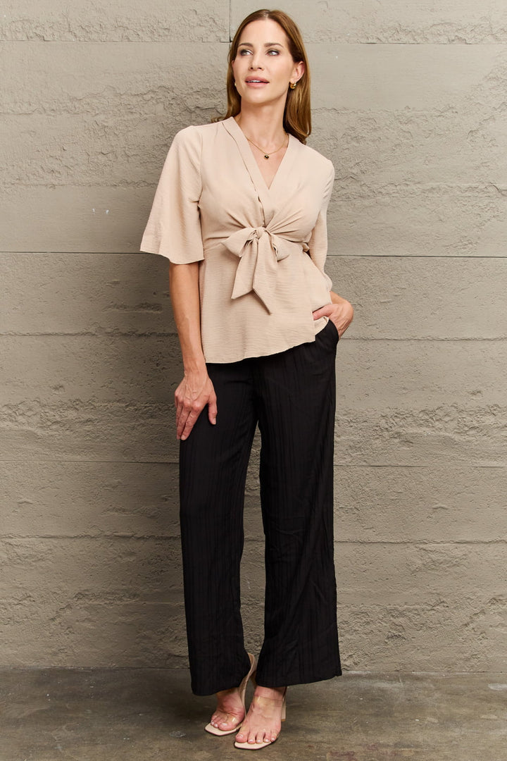 Twist tie-front V-neck blouse with half sleeves