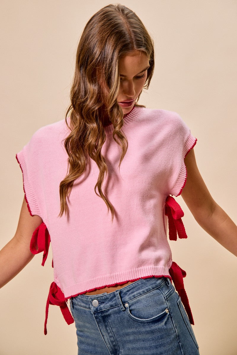 Dolman sleeve knit sweater top with side ribbon ties