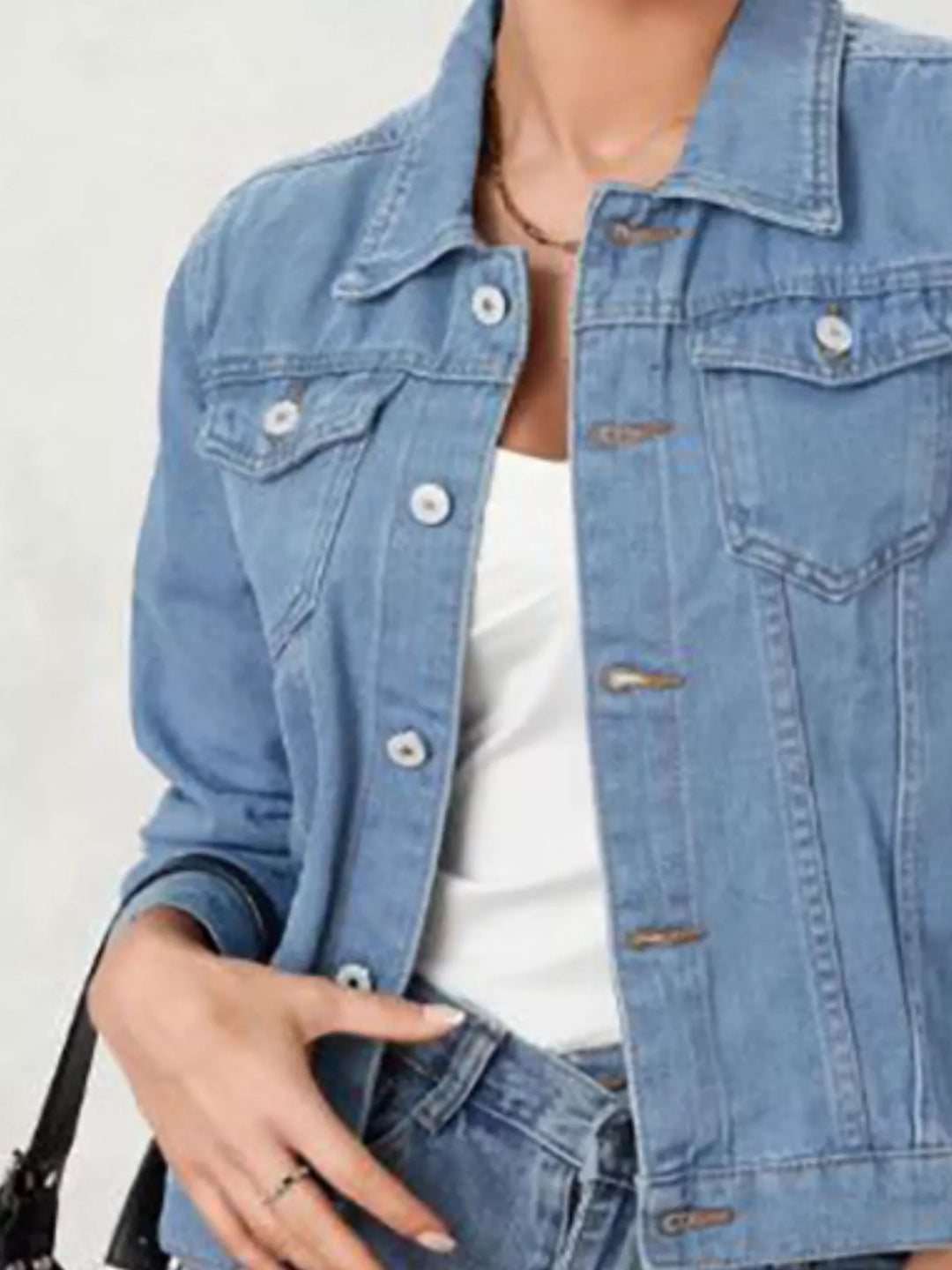 Cropped button-up denim trucker jacket with chest pockets