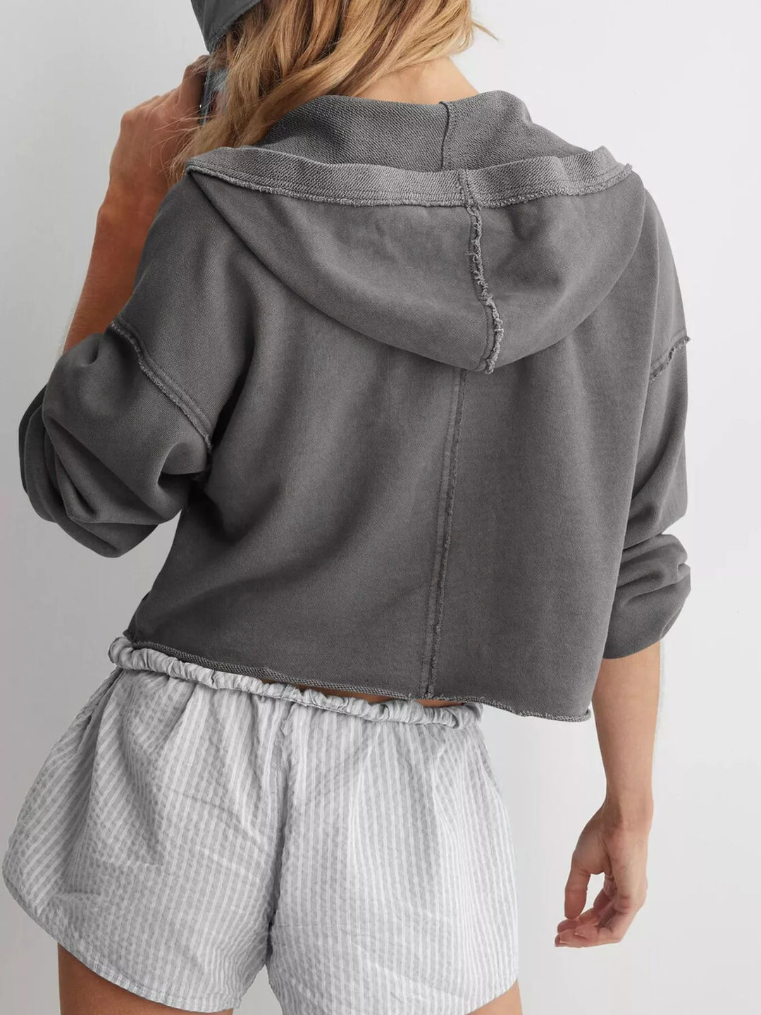 Cropped exposed-seam pullover hoodie with split neck