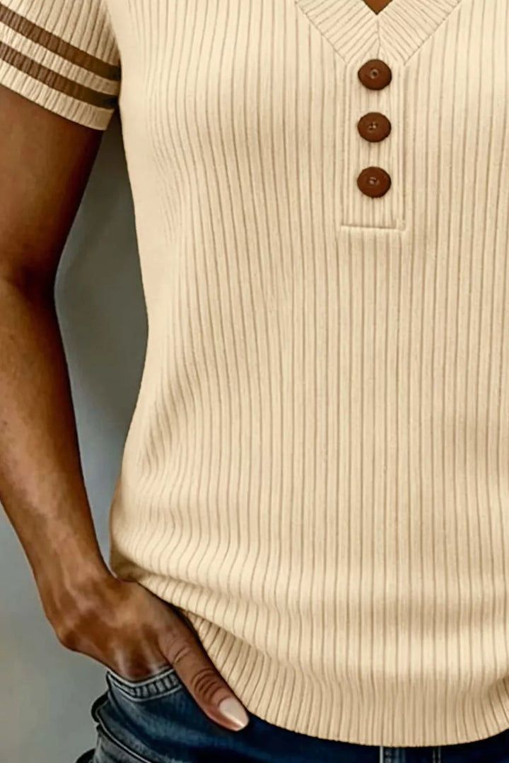 Ribbed knit V-neck top with striped sleeves and button placket