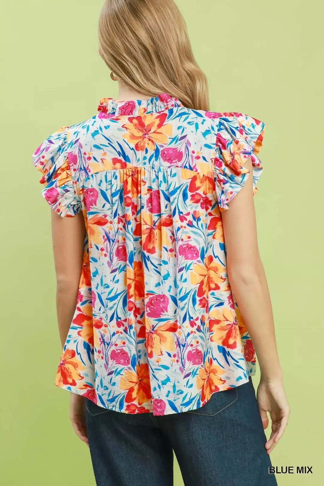 Smocked yoke floral blouse with flutter ruffle sleeves