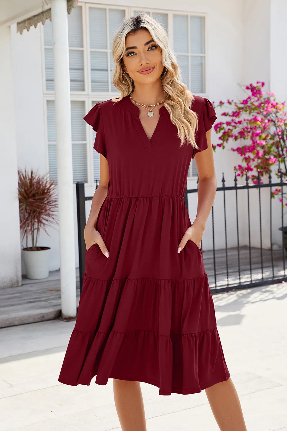 Flutter sleeve tiered midi dress with notched V-neck