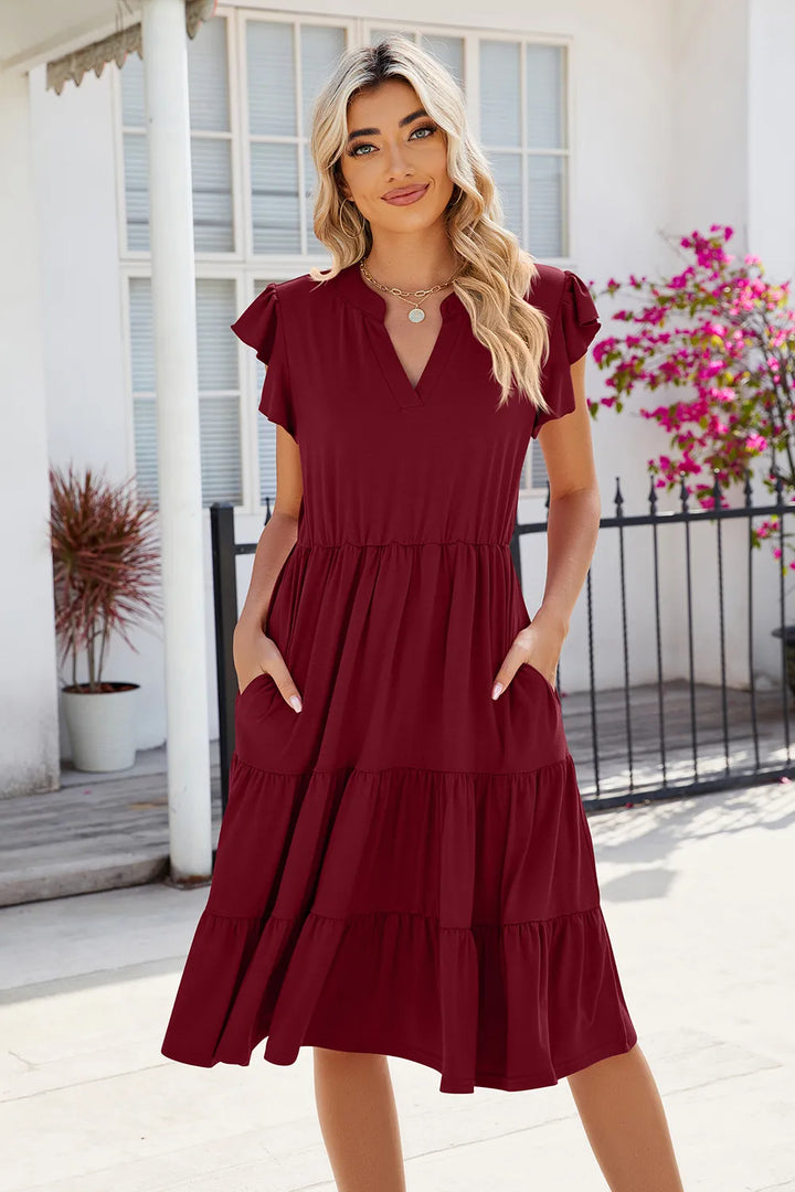 Flutter sleeve tiered midi dress with notched V-neck
