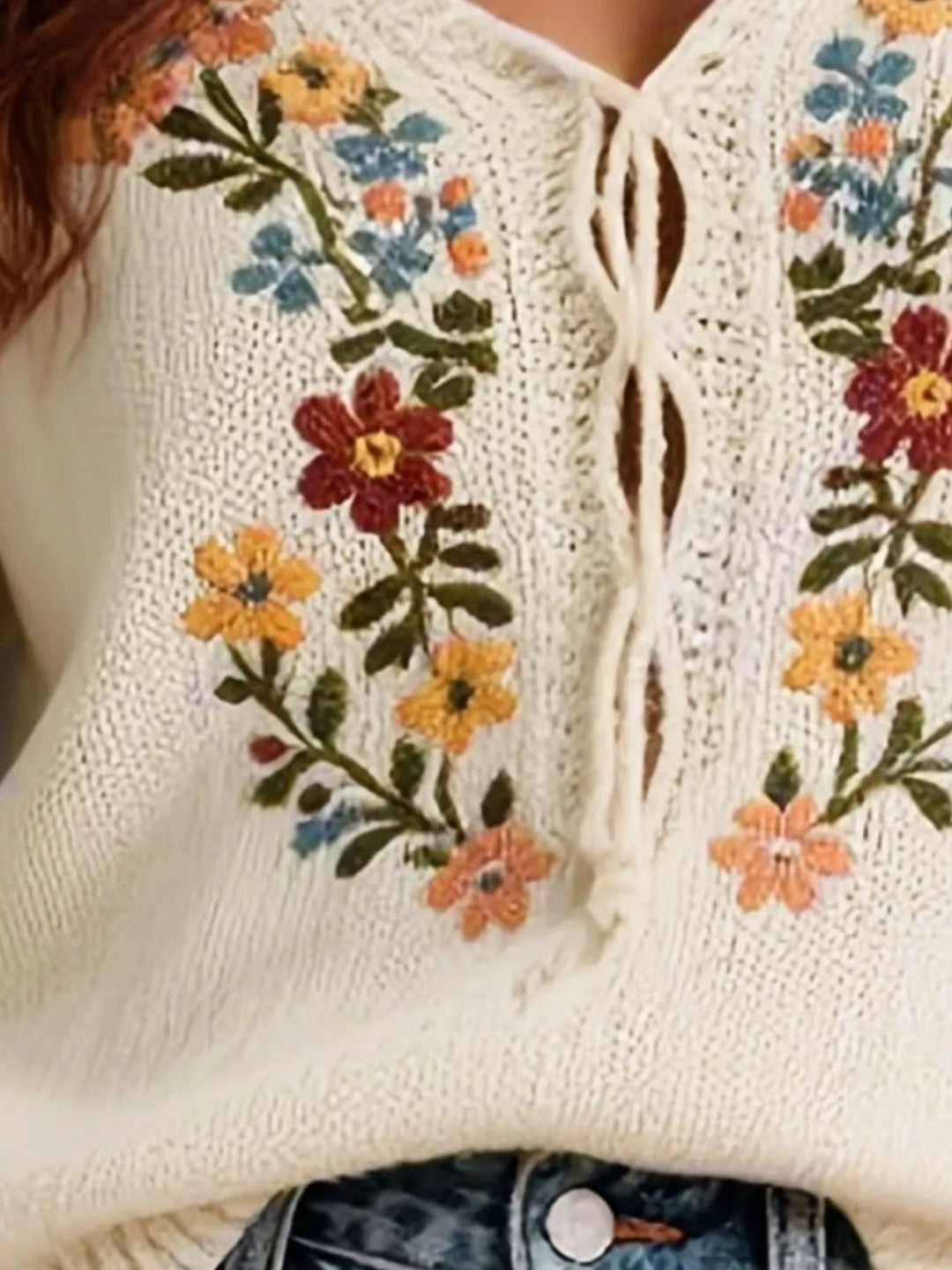 Floral embroidered short sleeve knit sweater with lace-up neckline