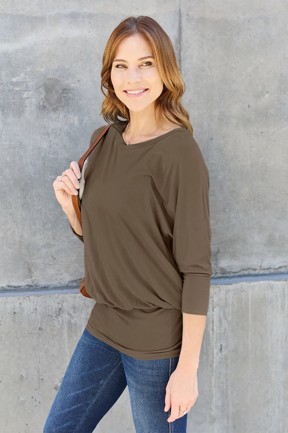 Batwing sleeve top with banded blouson hem