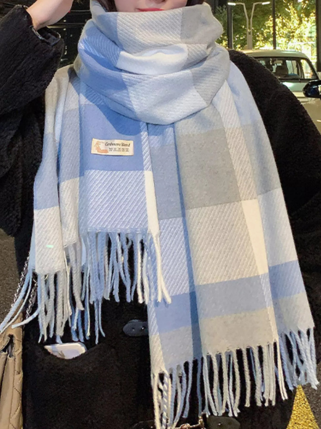 Oversized plaid wool scarf with fringe trim
