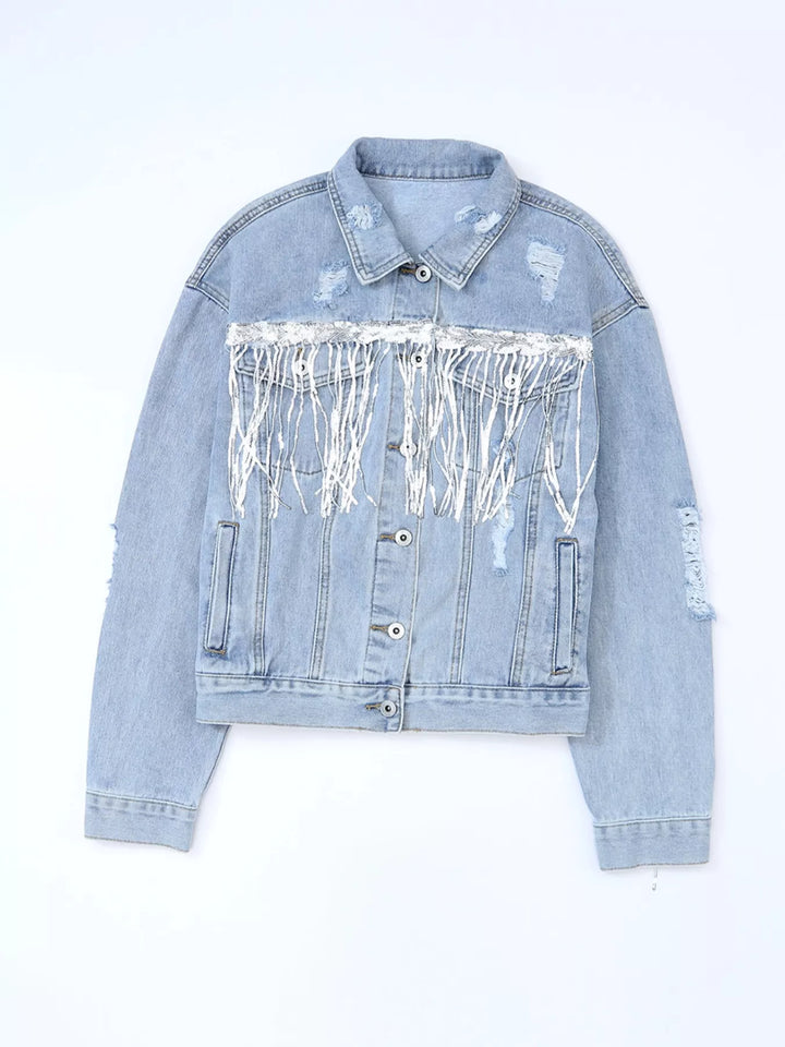 Distressed denim jacket with sequin fringe and chest pockets