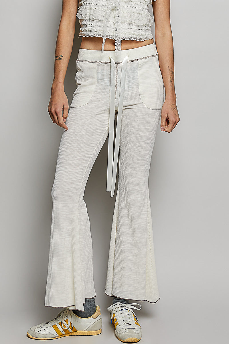 NATURAL Ribbed knit flare pants with drawstring waist and patch pockets