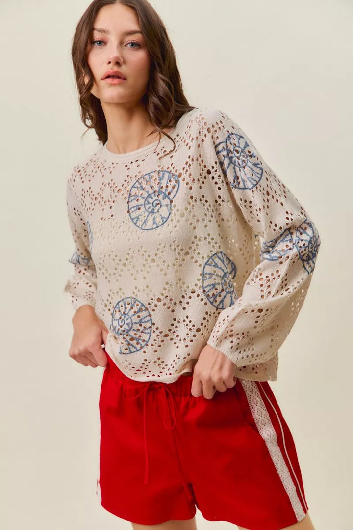 Seashell motif openwork knit long sleeve top