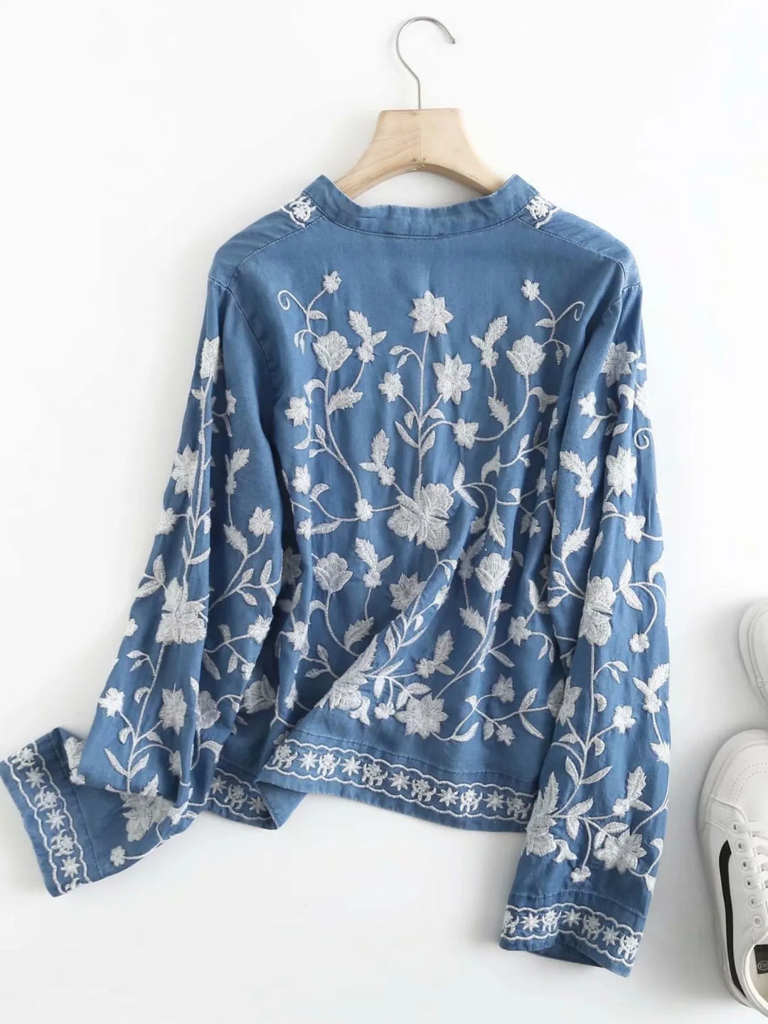 Floral embroidered button-up denim shirt