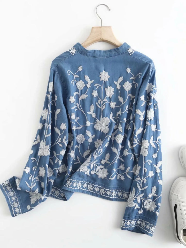 Floral embroidered button-up denim shirt