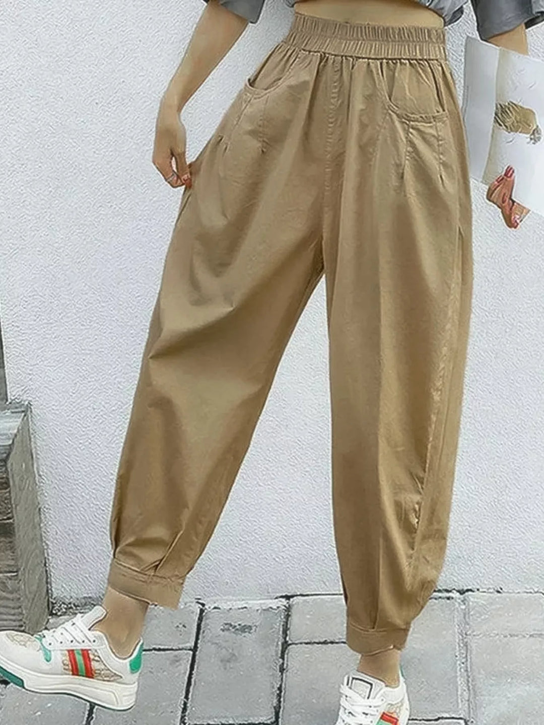 Khaki Pleated harem pants with elastic waist and tapered cuffs
