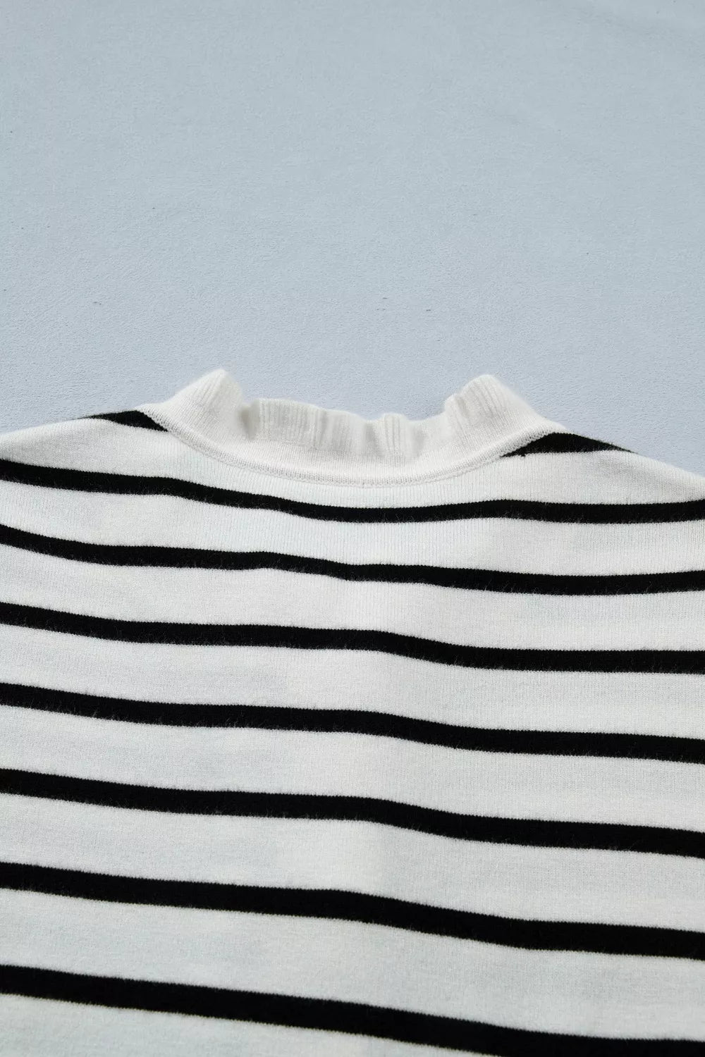 Striped short sleeve knit cardigan with ruffle trim