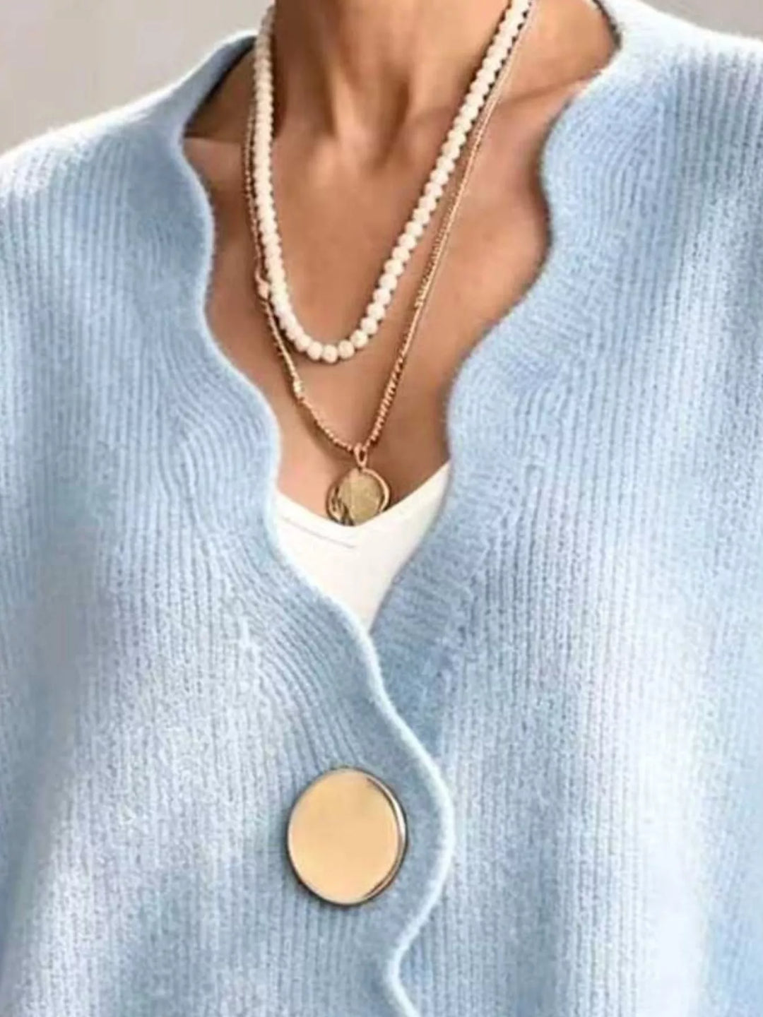 Scalloped-edge ribbed knit oversized button-down cardigan