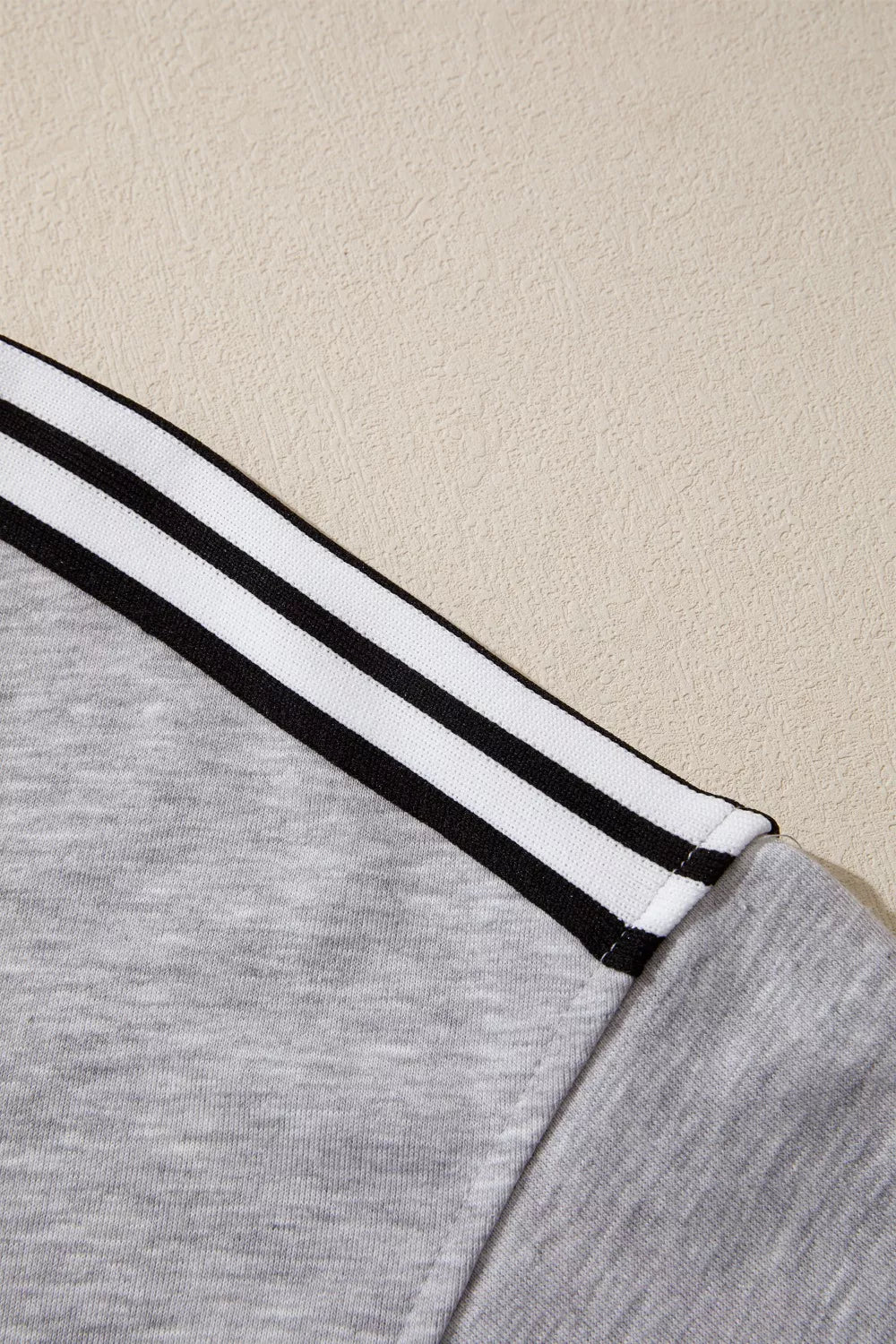 Relaxed fit tee with varsity shoulder stripes
