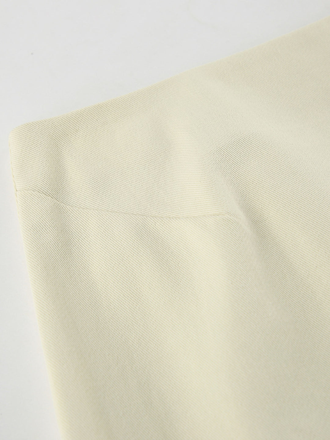 Straight-cut cotton midi skirt with back slit
