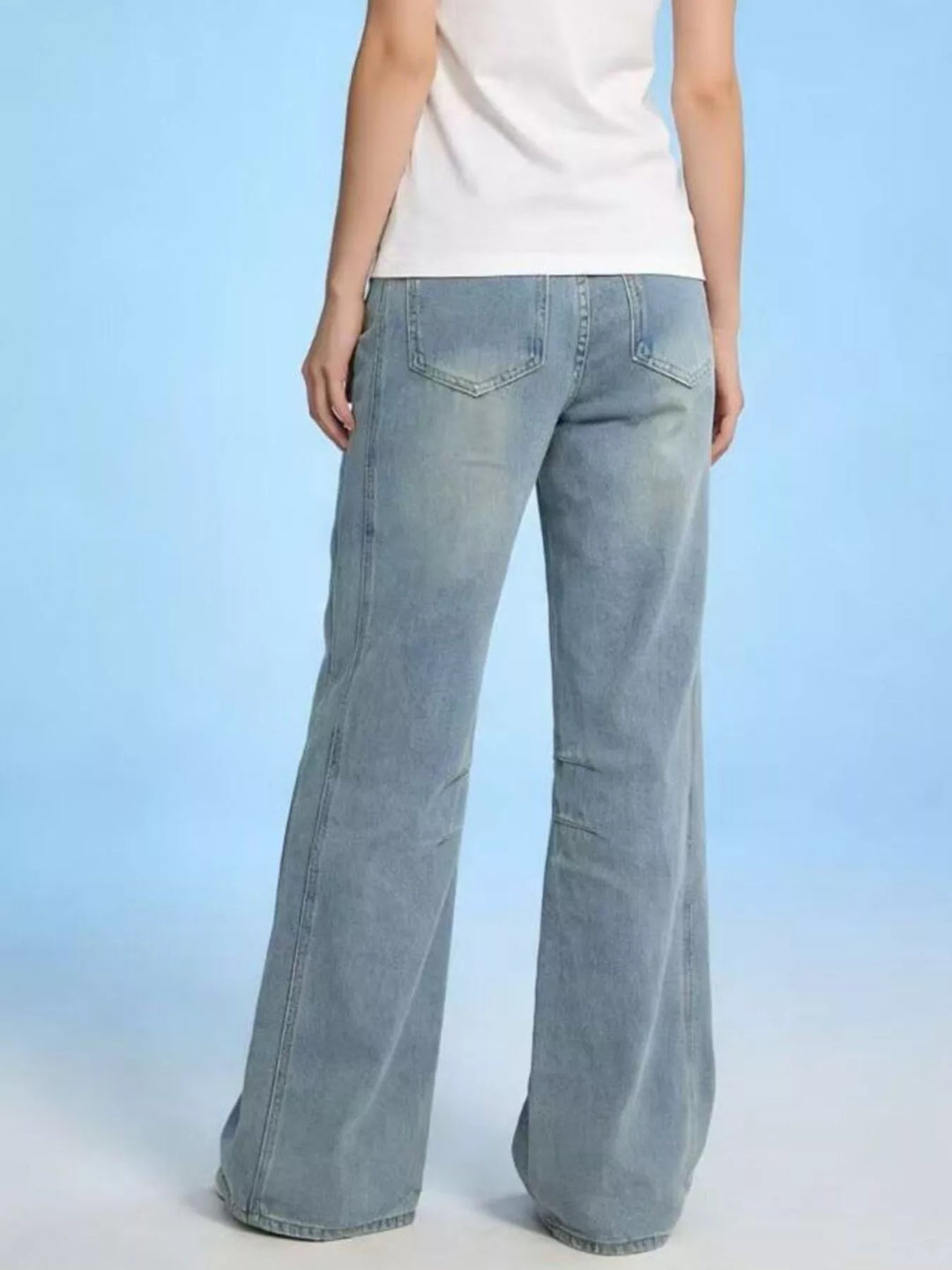 Wide-leg high-rise jeans with paneled knee seams