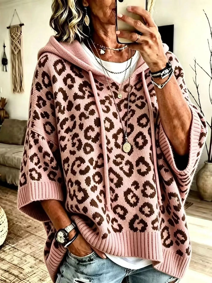 Leopard print drawstring hooded sweater with dolman sleeves