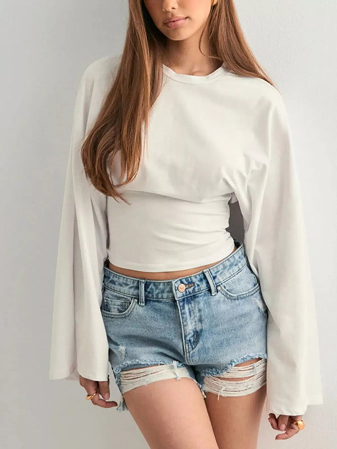 Fitted long sleeve top with flared bell sleeves