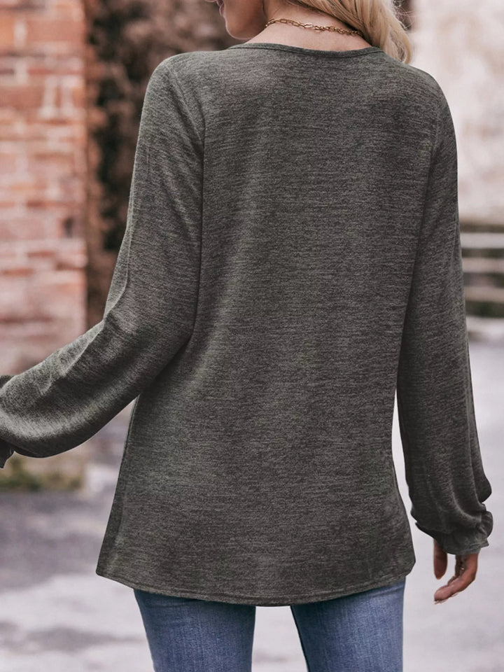 Ruffle cuff long sleeve top with pleated neckline