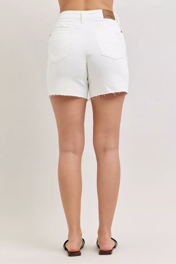 High-rise distressed denim dad shorts with raw hem