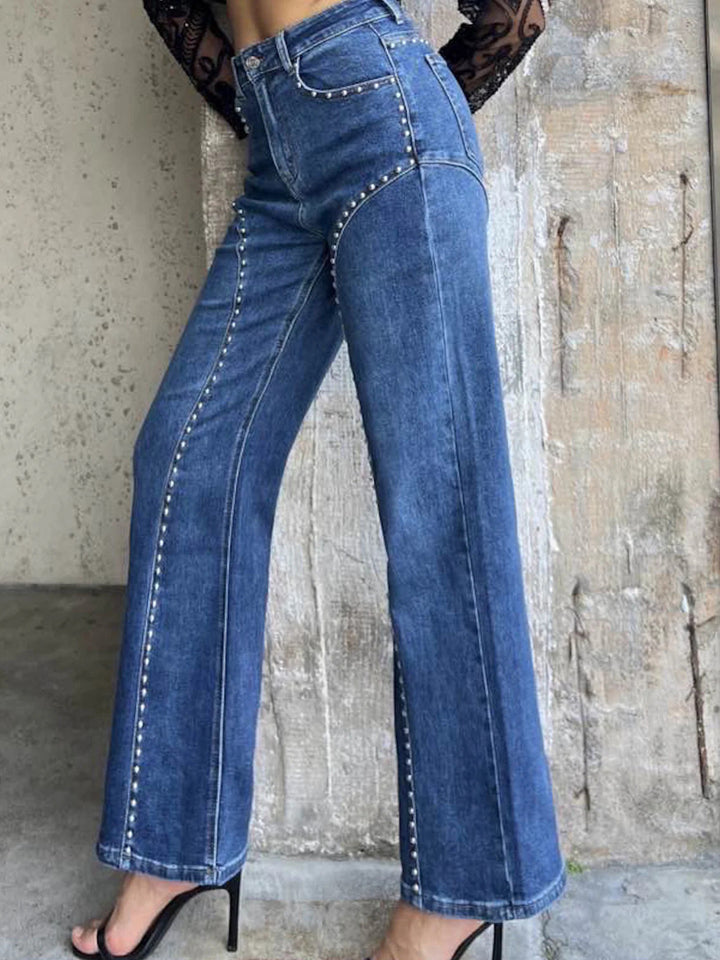 Studded high-rise wide-leg jeans with curved seam detail