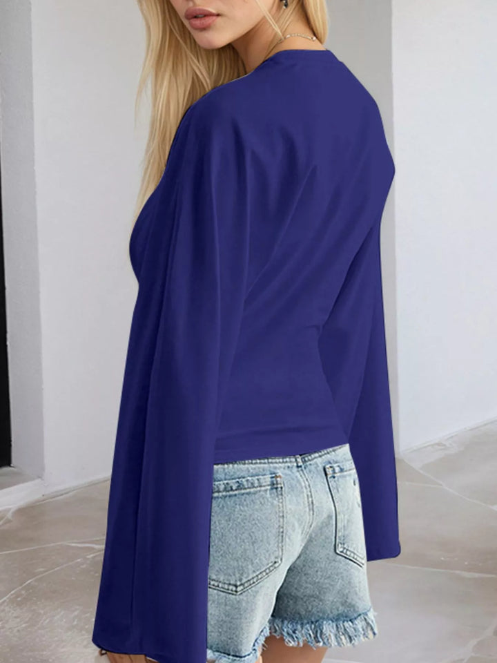 Fitted long sleeve top with flared bell sleeves