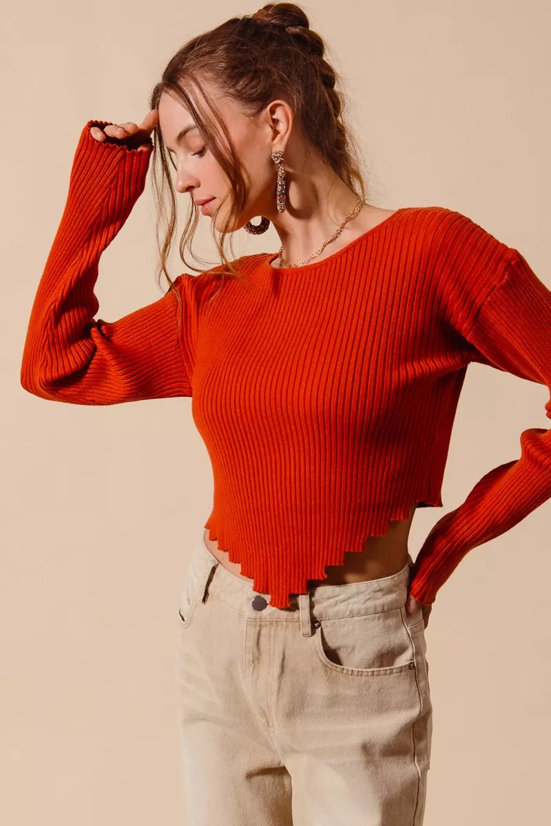 Ribbed knit crop sweater with shaped hem and long sleeves