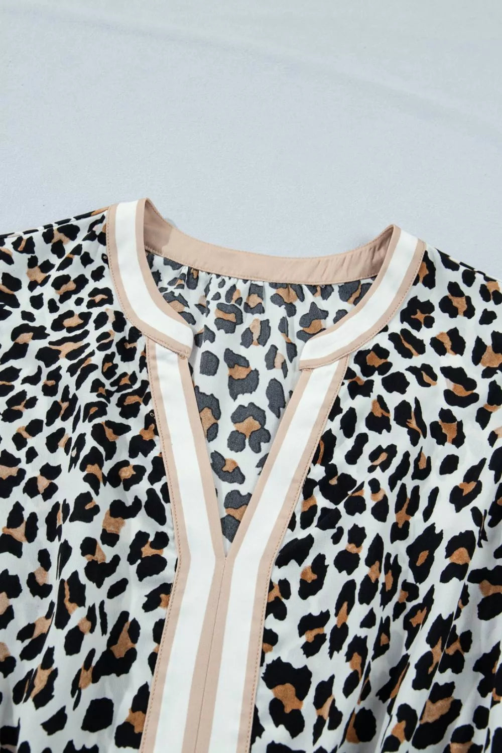 Leopard print tiered midi dress with contrast trim
