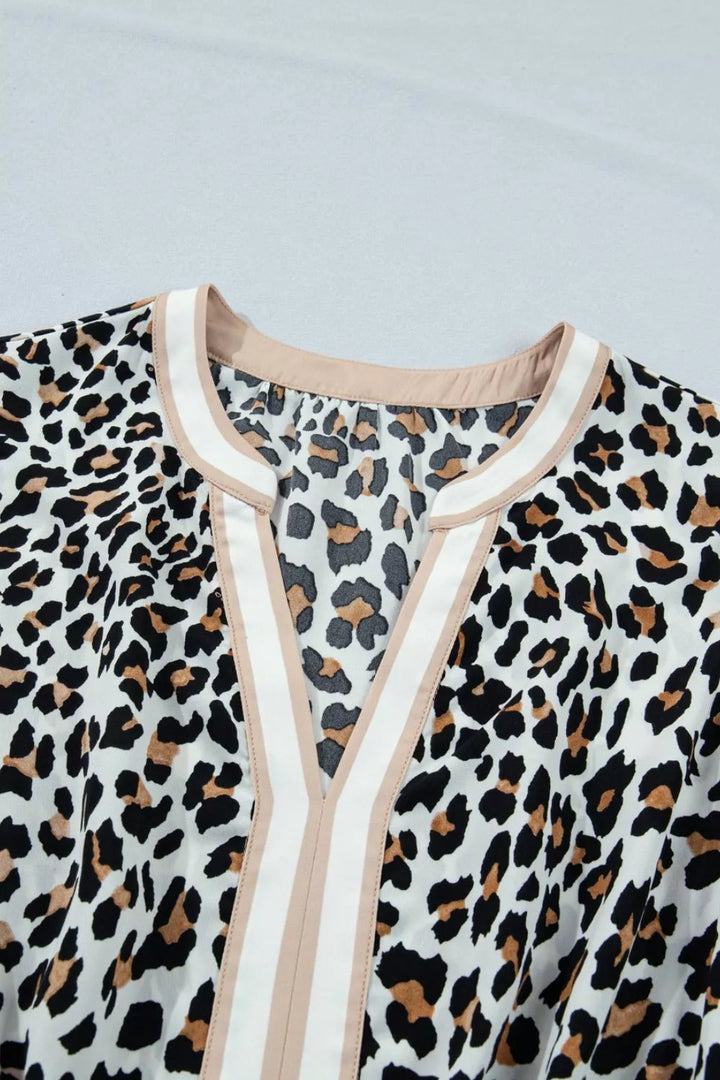 Leopard print tiered midi dress with contrast trim