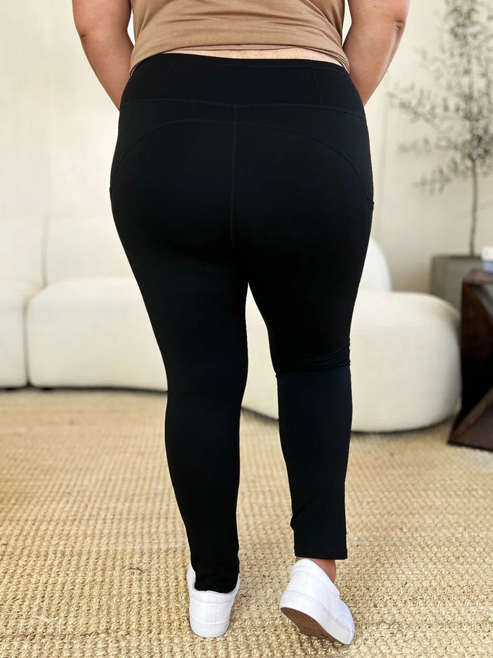 Wide waistband sports leggings with side pockets
