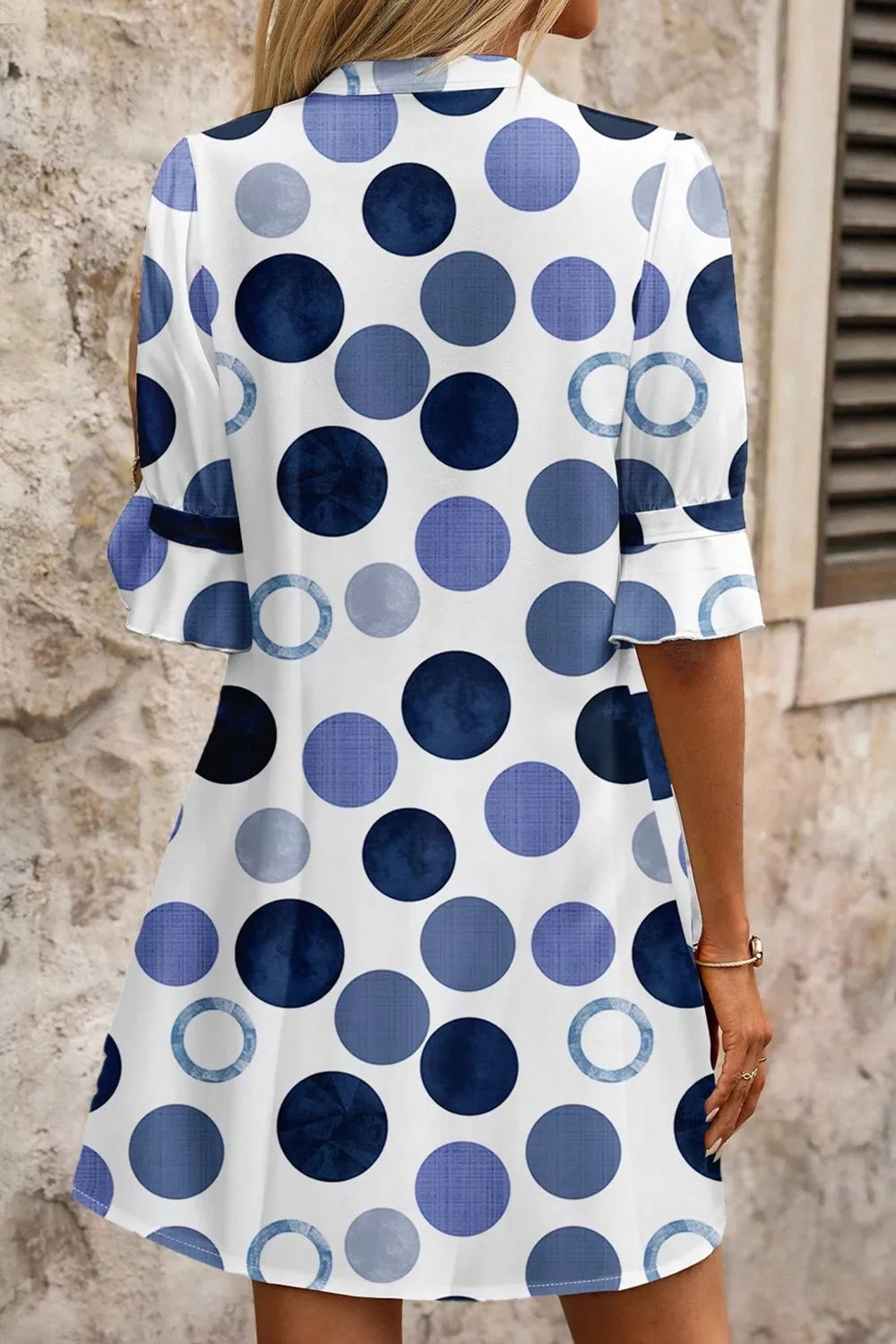 Polka dot v-neck mini dress with flounce sleeves