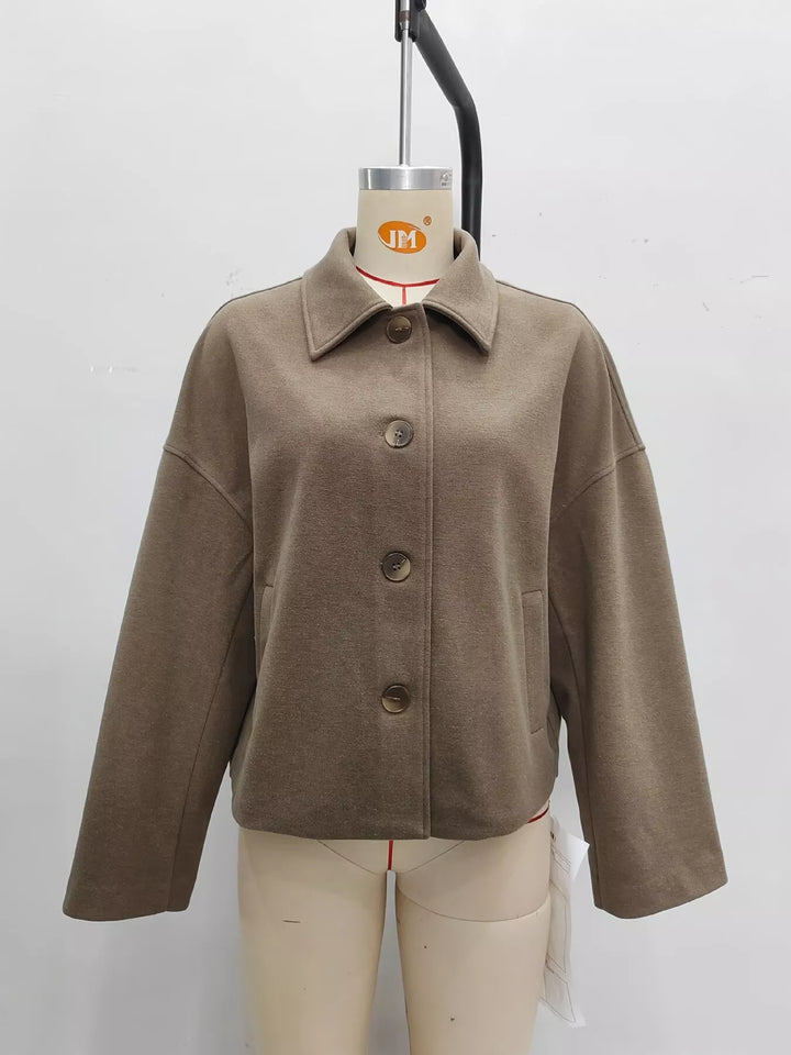 Cropped wool-feel jacket with dropped shoulders and slash pockets