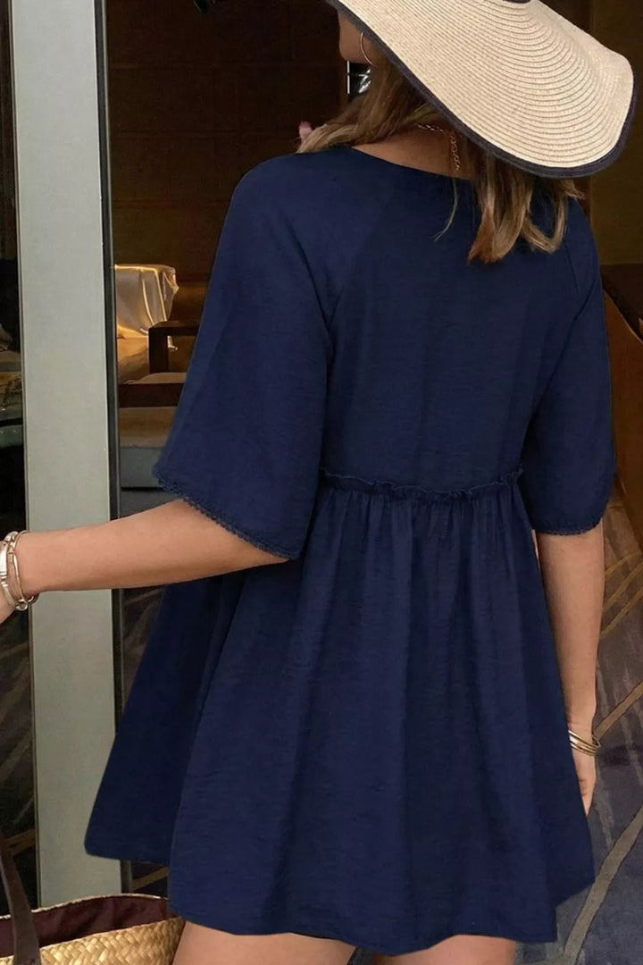 Ruffle hem V-neck blouse with embroidered yoke and lace-trim sleeves